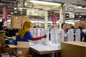 What does outsource manufacturing mean ?